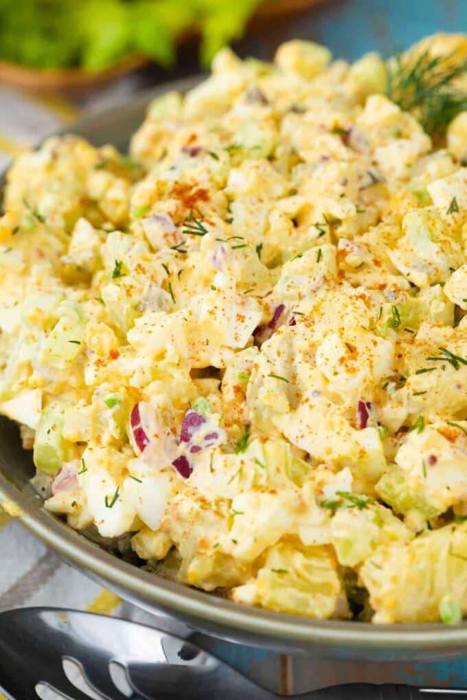 a bowl of creamy deviled egg potato salad
