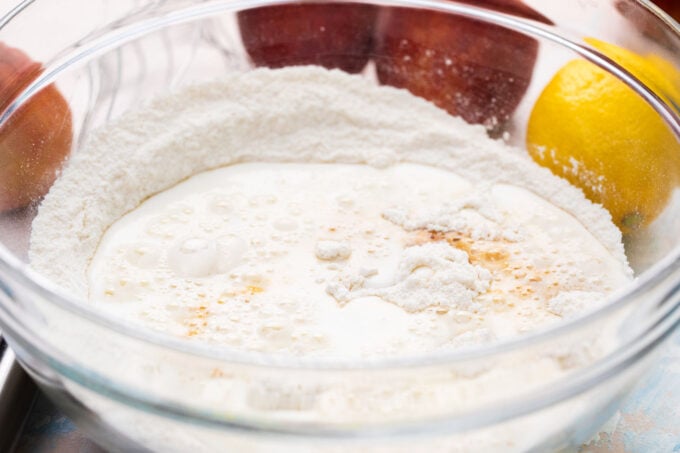 Cobbler dough ingredients mixed in a bowl.