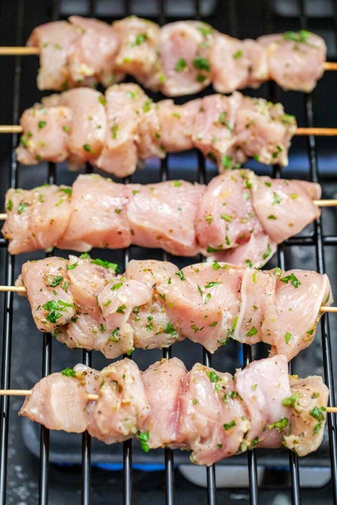 Grilling chicken souvlaki.