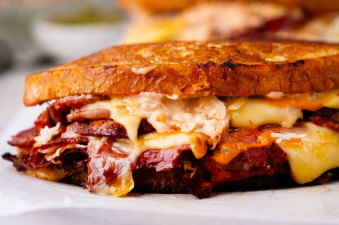 Homemade corned beef sandwiches with cheese.