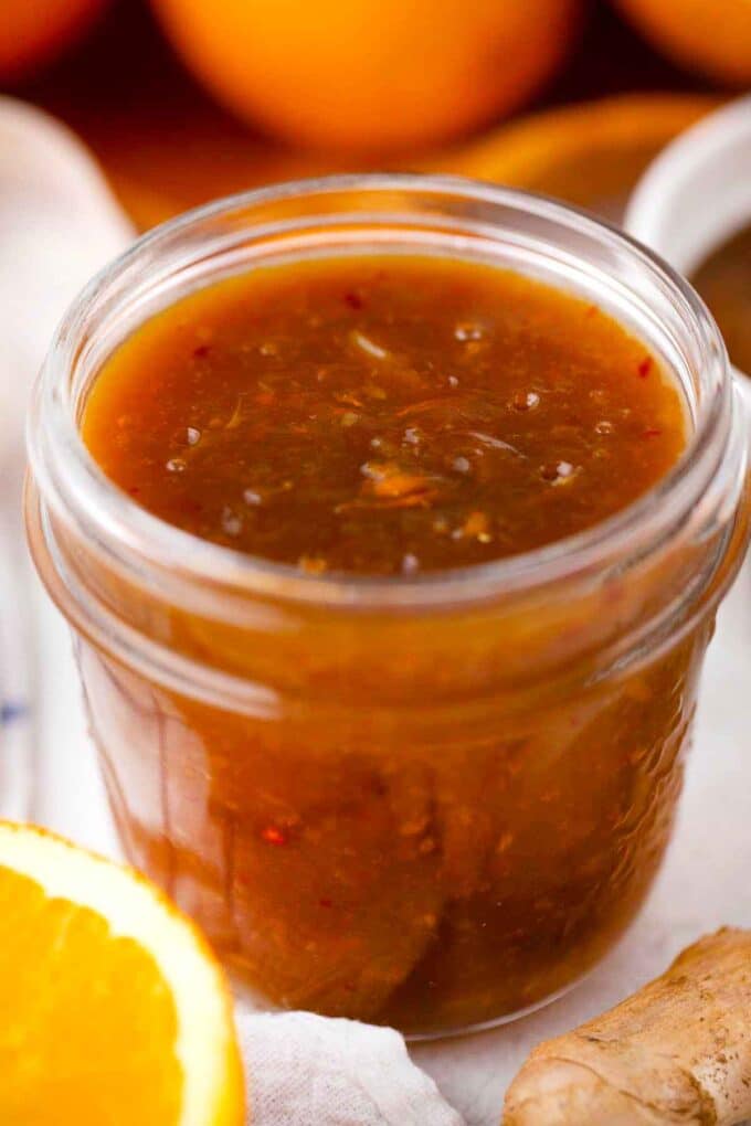 homemade orange sauce in a jar