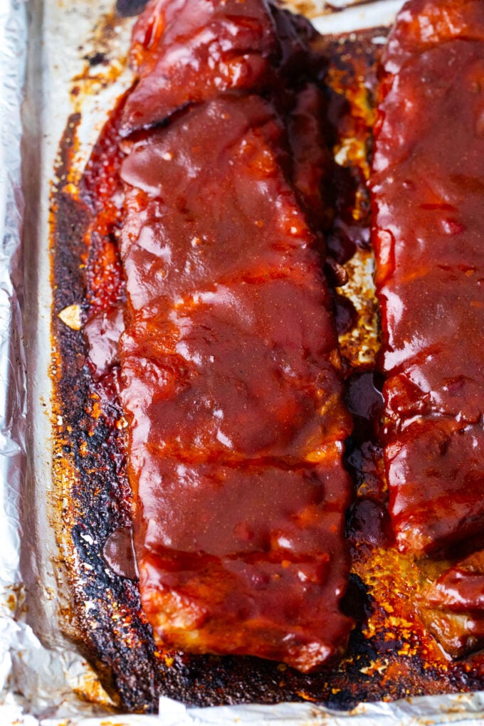 Overhead shot of oven baked barbecue ribs.