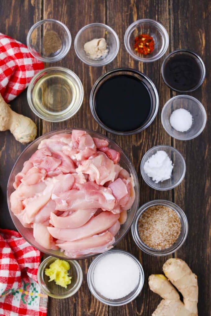 instant pot general tso chicken ingredients in bowls on a wooden table