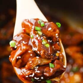 a large spoonful of perfectly cooked instant pot general tso chicken