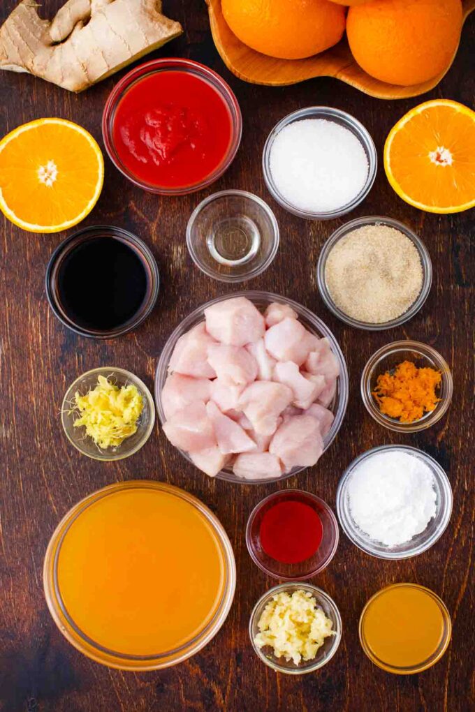 instant pot orange chicken ingredients in bowls on a table