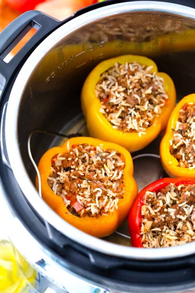 instant pot stuffed peppers on a trivet in the pressure cooker