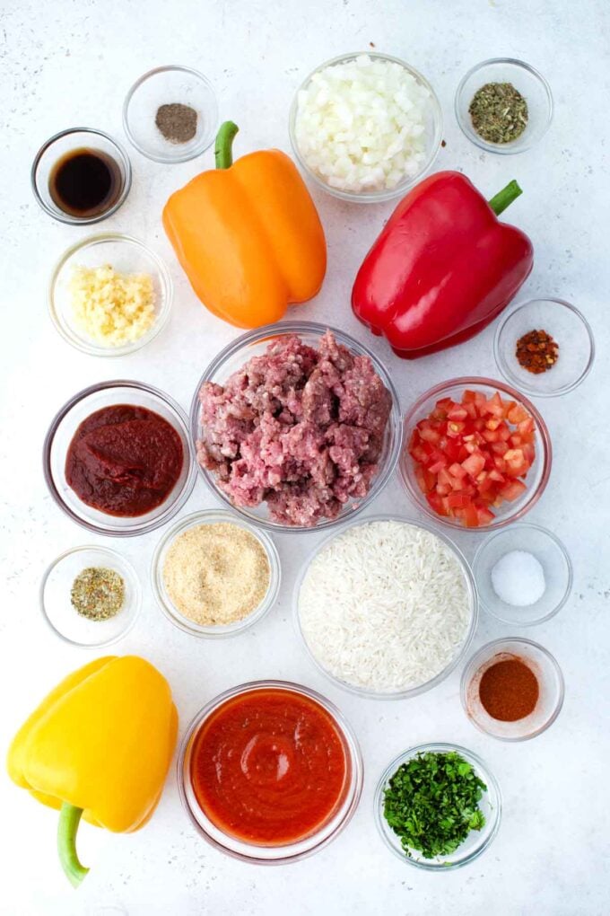 instant pot stuffed peppers ingredients in bowls on a table