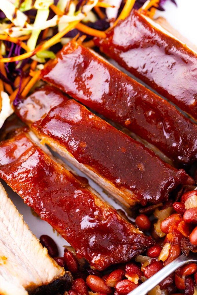 Sliced oven baked barbecue ribs.