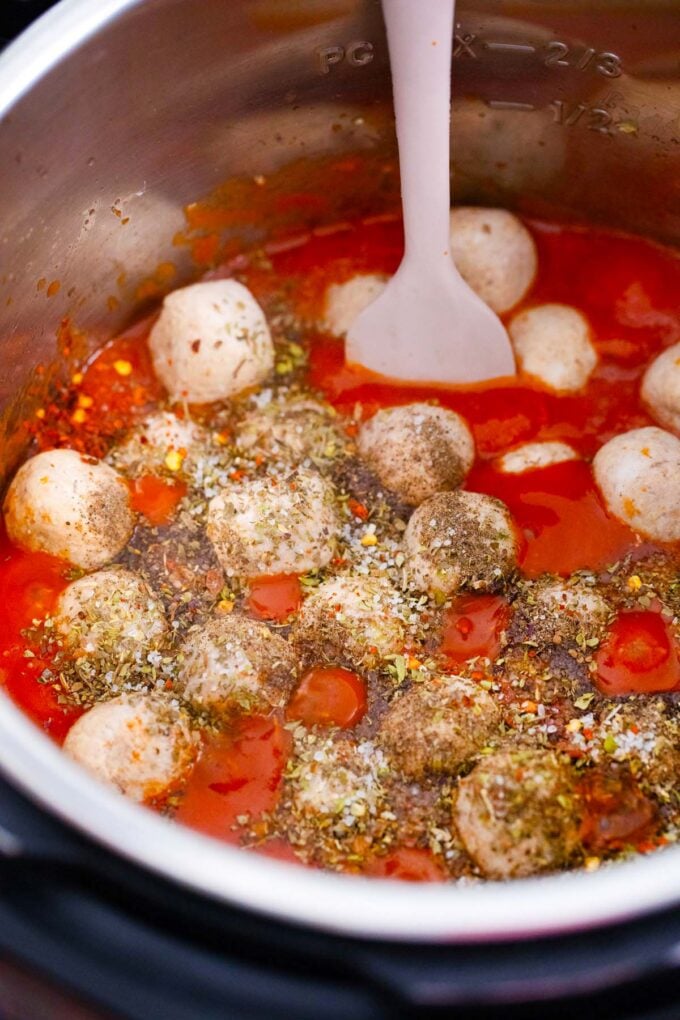 Instant Pot Italian meatball soup ingredients in the pot.