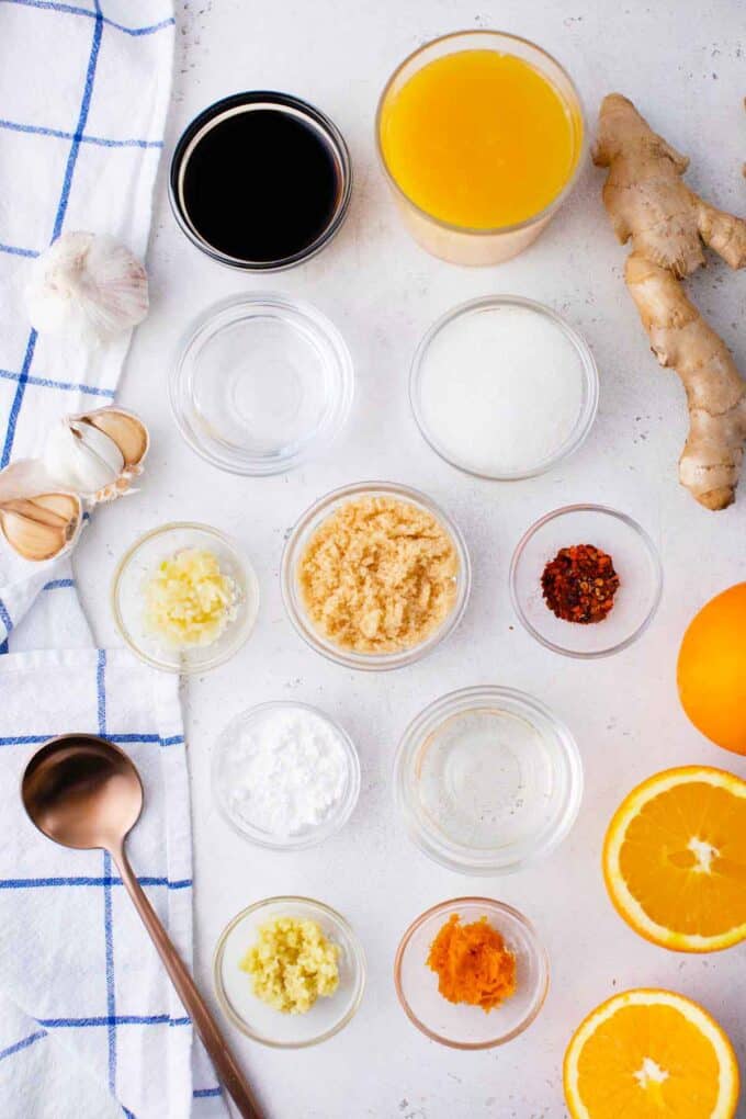 orange sauce ingredients in bowls on a table