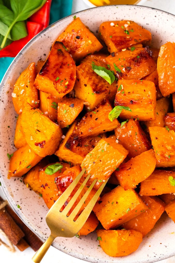 A bowl of brown sugar roasted sweet potatoes.