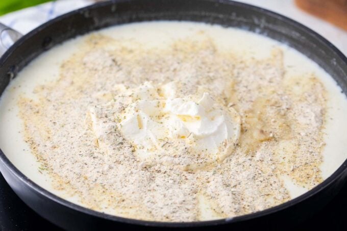 Roux with cream cheese in a pan.