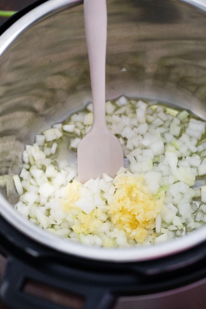 Sautéing onion and garlic in the instant pot.