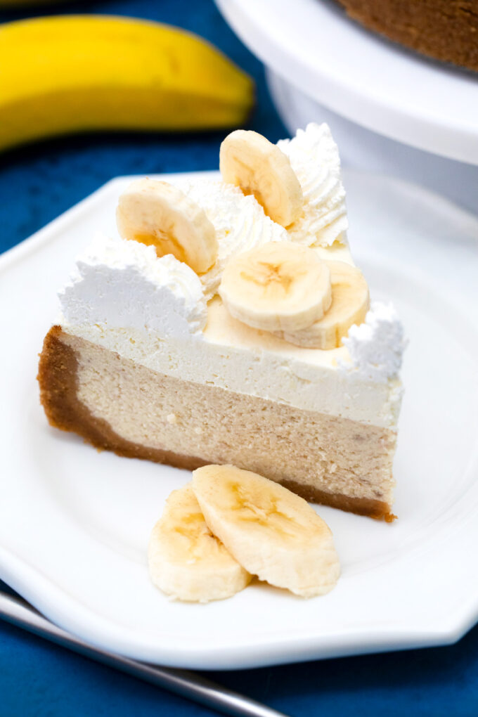 A slice of homemade Cheesecake Factory banana cream cheesecake copycat.
