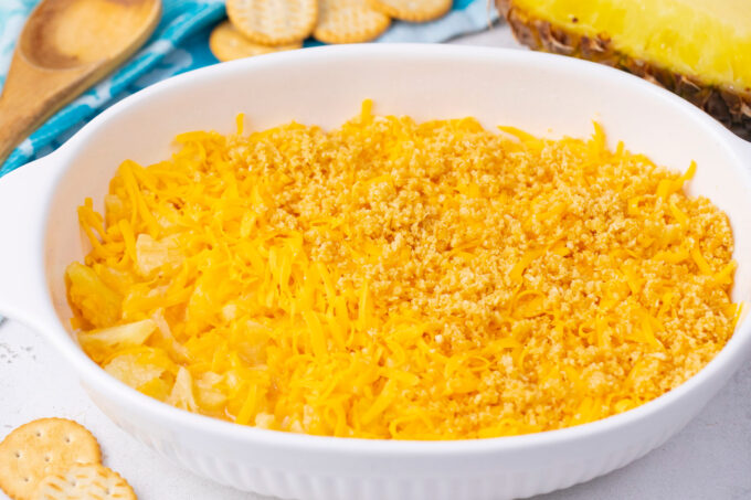 Cheddar cheese layer on pineapple casserole.