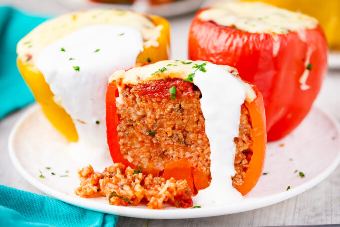 Homemade beefy stuffed peppers sliced in half.