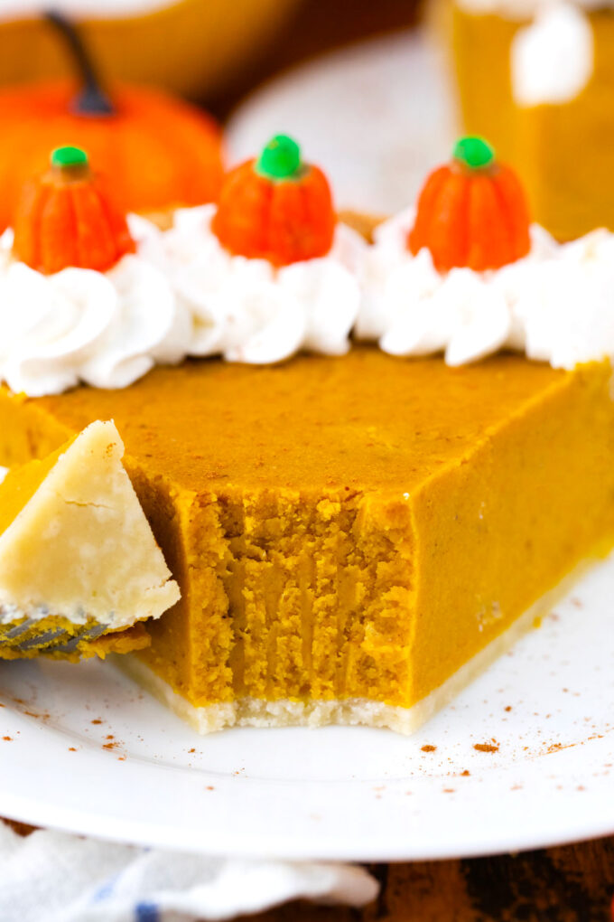 A forkful of tender, homemade classic pumpkin pie.