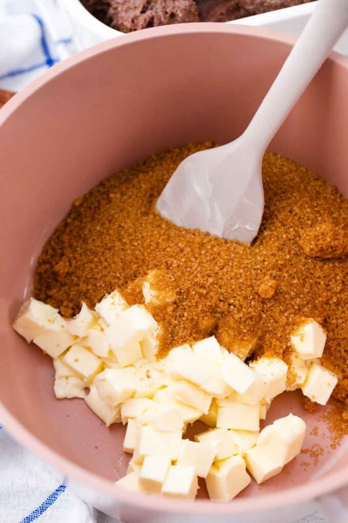 butter and brown sugar in a pink saucepan