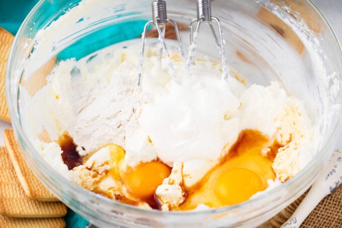 Cheesecake layer ingredients in a bowl.