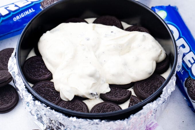 Oreo cheesecake in a springform pan.