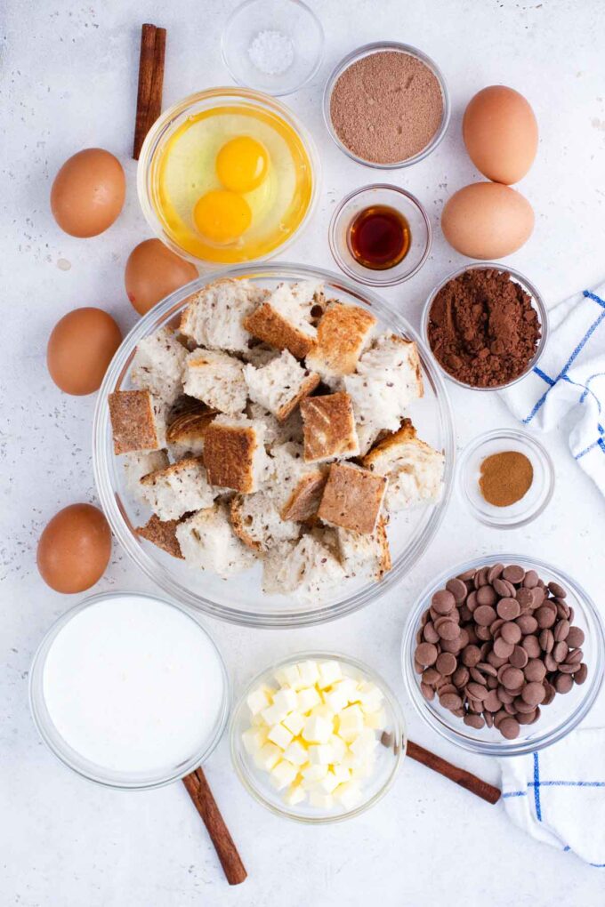 chocolate French toast casserole ingredients in bowls on a table