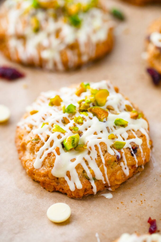 Oatmeal cranberry pistachio cookies on a cookie sheet.
