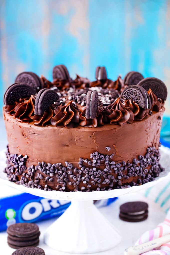 Dream extreme Oreo cake on a cake stand.