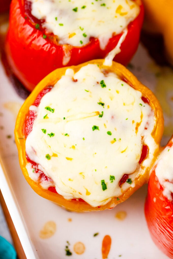 Overhead shot of cheesy stuffed peppers.