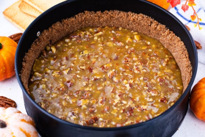 Pecan pie layer in a graham crust.