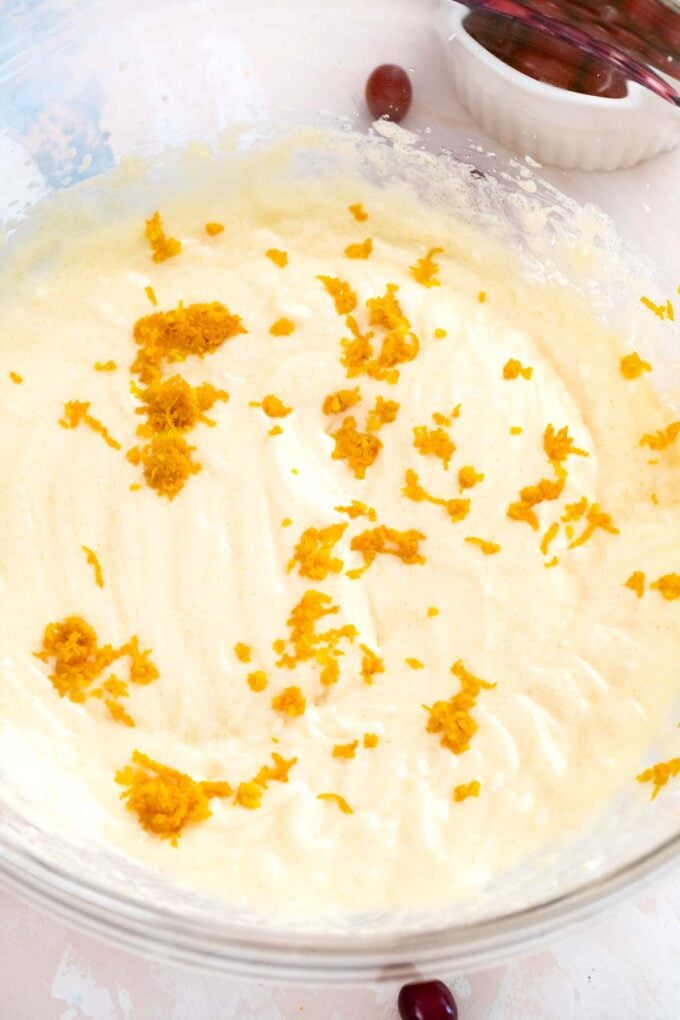 adding orange zest to muffin batter