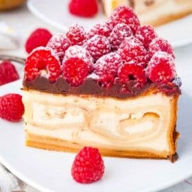 a slice of crepe stuffed new york cheesecake