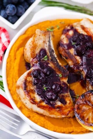 bone-in blueberry pork chops with mashed sweet potatoes