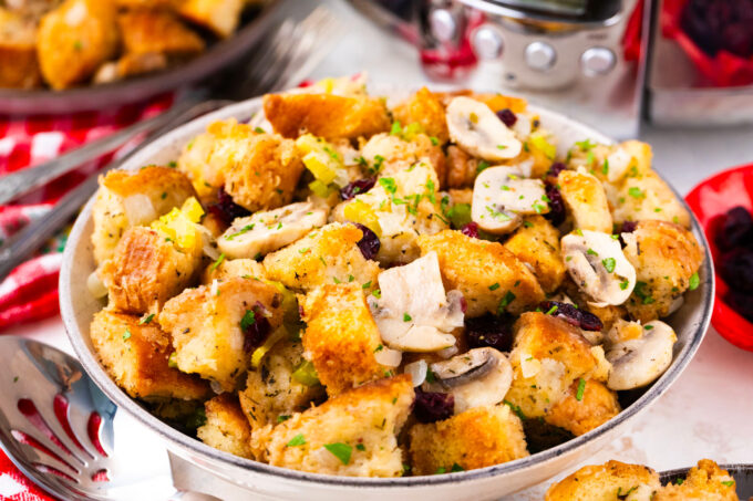 A plate of crockpot stuffing with veggies.