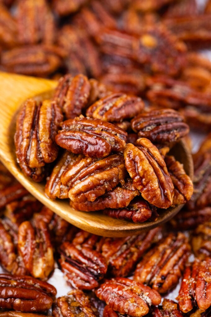 A spoonful of crunchy oven roasted candied pecans.