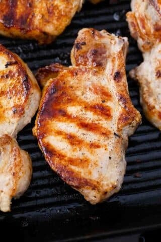 grilling bone-in pork chops on a grill pan