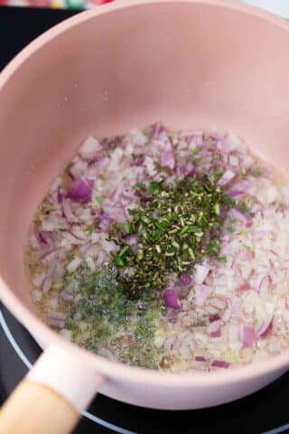 chopped shallot, rosemary, and thyme in a saucepan