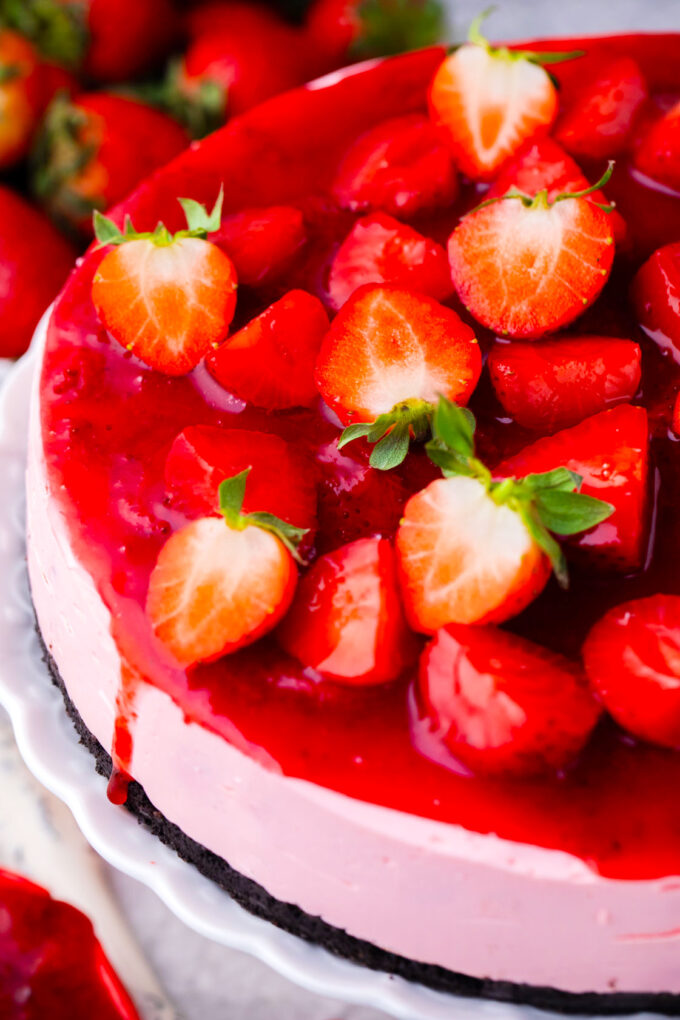 Homemade no-bake strawberry cheesecake with strawberry topping.