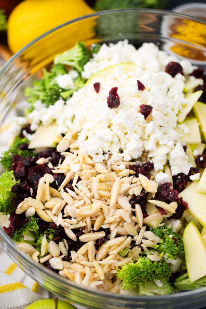 Broccoli cauliflower salad ingredients in a bowl.