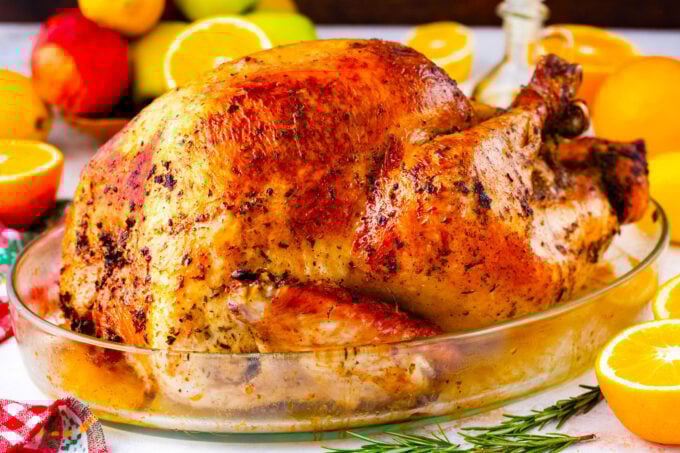 Perfectly browned and crispy whole oven roasted turkey.