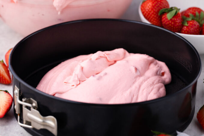 Homemade pink strawberry cheesecake filling.