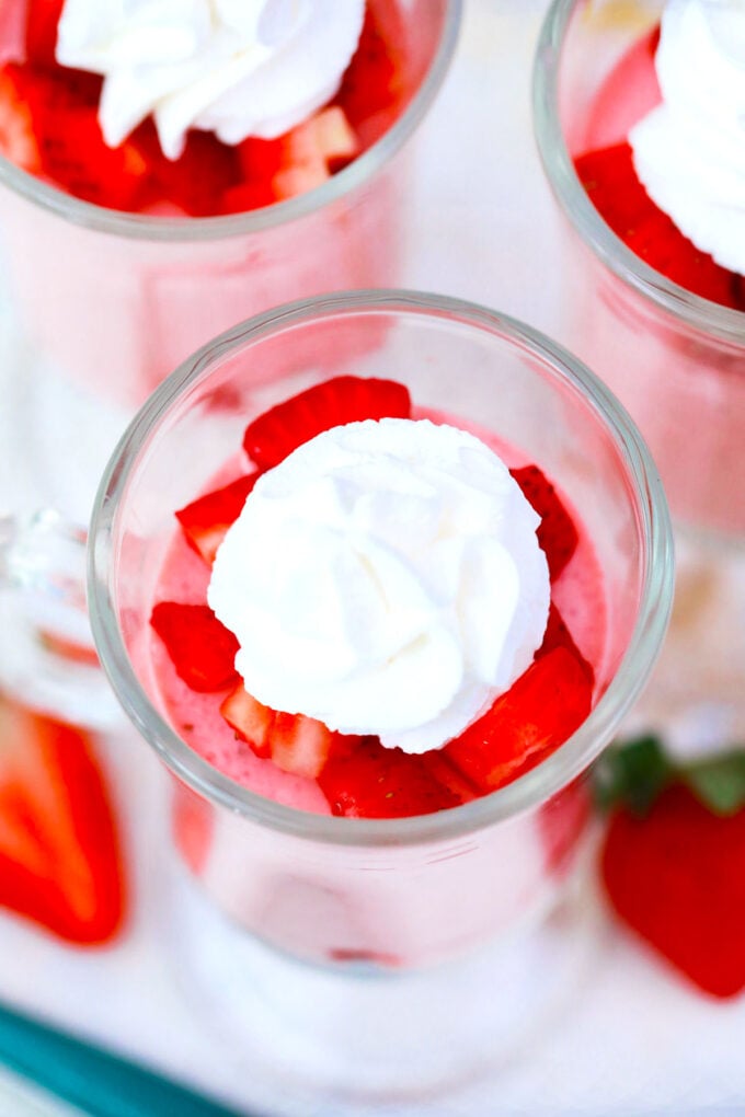 Overhead shot of strawberry mousse cups.