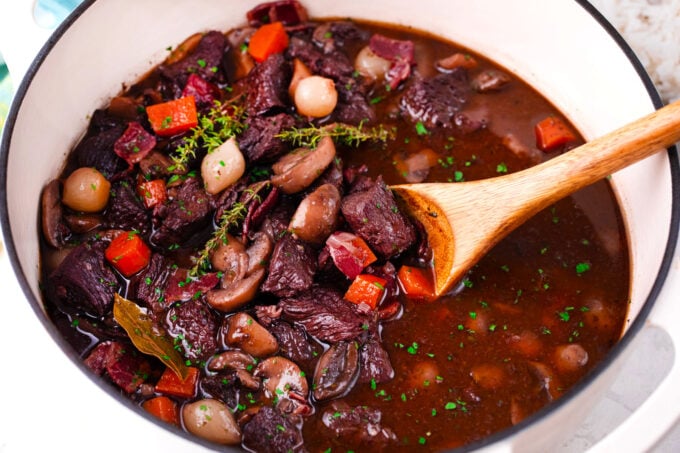 Red wine beef Bourguignon in a Dutch oven.