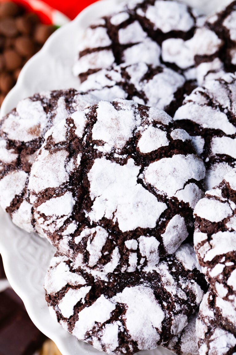 Chocolate crinkle cookies on a plate.