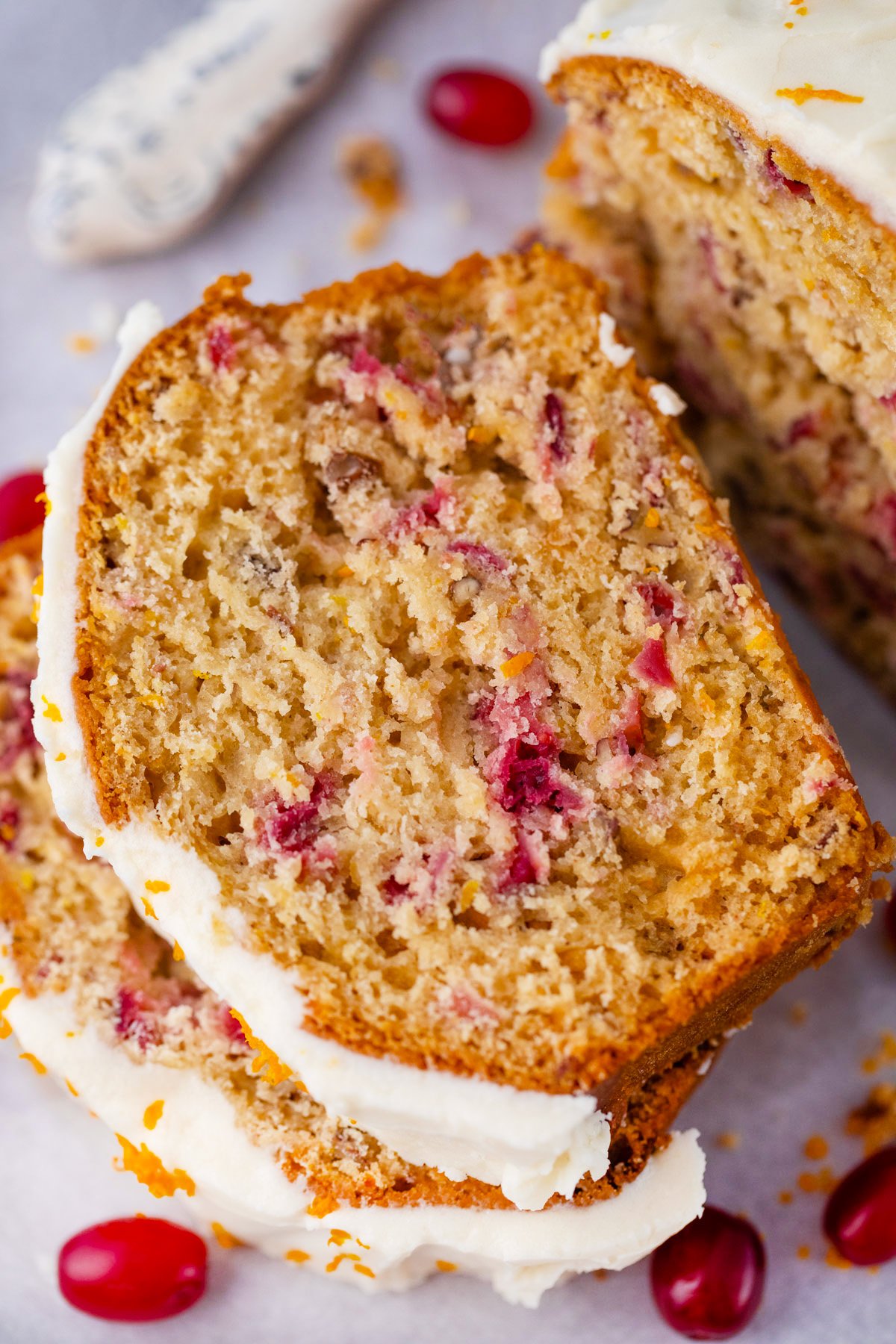 Homemade cranberry bread with fresh cranberries.