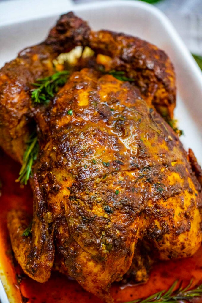 garlic herb butter roasted chicken with fresh rosemary.