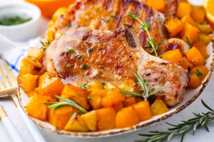 a platter of juicy pumpkin pork chops