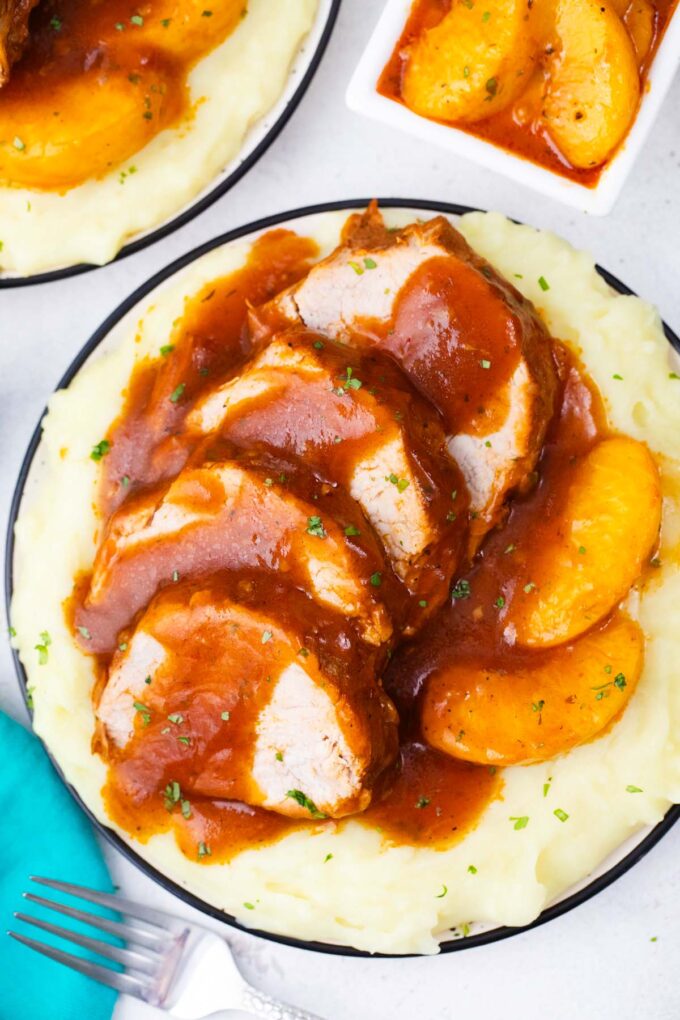 Overhead shot of sliced slow cooker peach pork.
