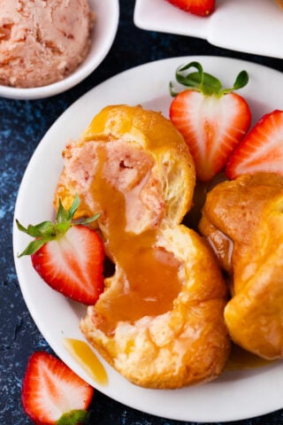 Jordan Pond popovers served with caramel sauce and strawberry batter.