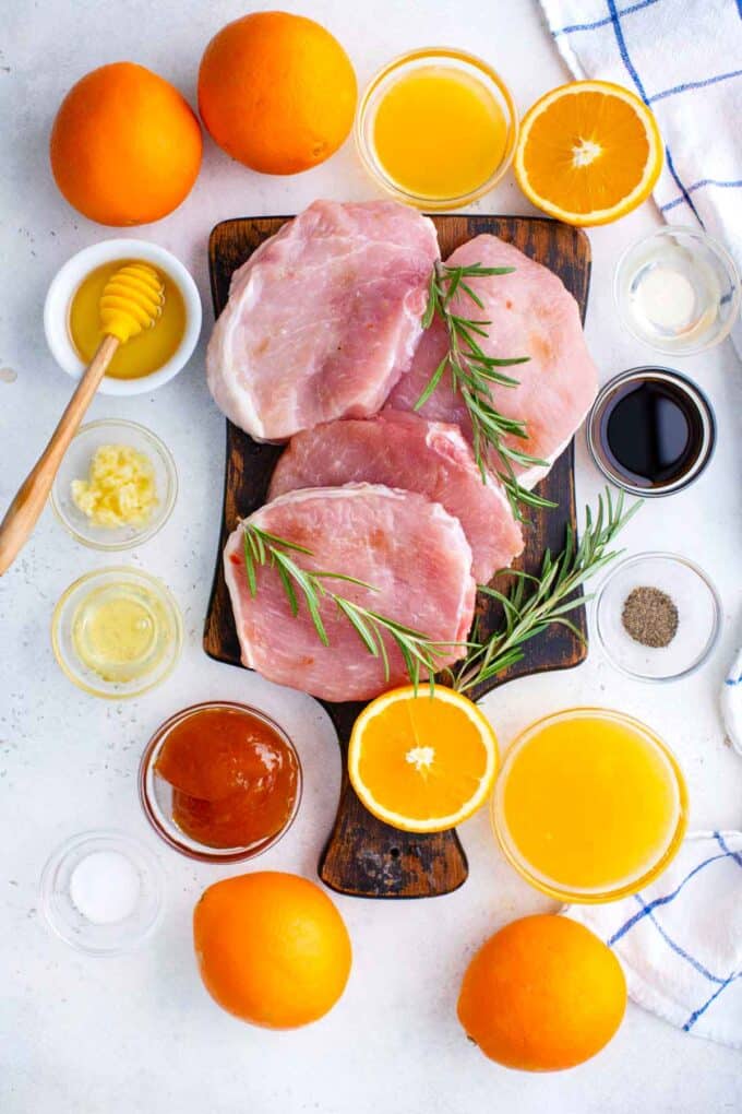 orange glazed pork chops ingredients in bowls on a table