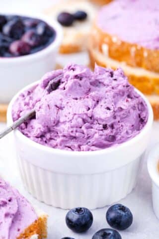 Fluffy blueberry butter in a ramekin.